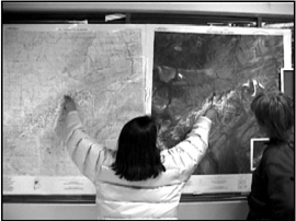 In Station Two students are guided in interpreting both a topographic map and satellite map. 