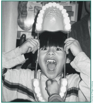 Zach Martin shows off his teeth at the 2001 Health Fair.