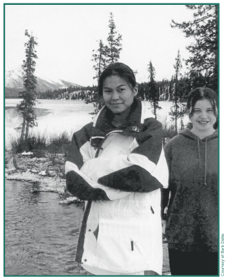Angie David and Mandi Reedy stand at the inlet of Fish Creek to Mentasta Lake.
