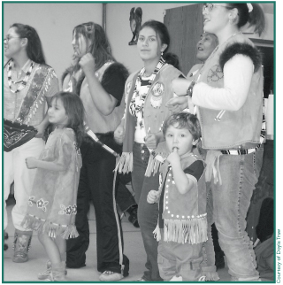 Jessica Denny, Stacie Charley, Stephanie Charley, Lena Charley, Marilynn Beeter, Colene Charley and Bjorn Beeter at 2002 Potlatch.