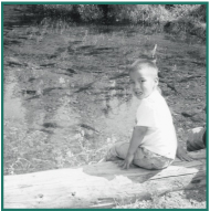 James Peterson watches salmon in Fish Creek, August 2001.