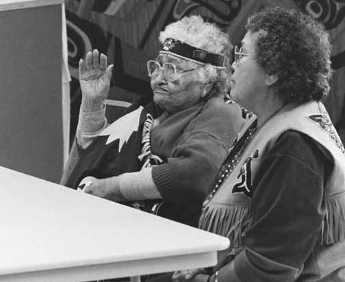 Annie Hotch testifies at the tribal court in Klukwan with help of interpreter Anna Katzeek.