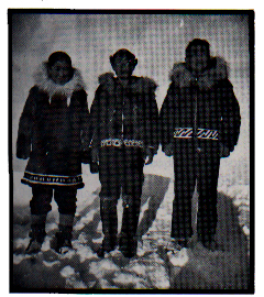 Tom Tomagnuk (center) with his two sons, Silas (left) and Gilbert (right).
