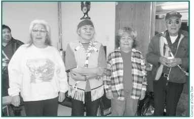  Elders Laura Hancock, Lena Charley, Ruby Sinyon and Johnny Nicolai at a Potlatch in Chistochina, 2002.