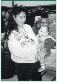 Carol Evans and Alexander at the 2001 Health Fair. 