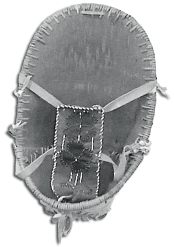 A traditional baby carrier made from birch bark, spruce root, and moose hide.