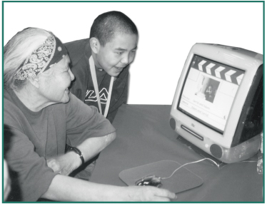 Chistochina student, Adam Nicolai, shows Elder Lena Charley