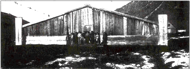 Children pose in front of the Whale House in Klukwan in this 1895 photo.