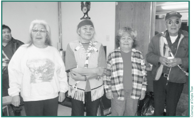 Elders Laura Hancock, Lena Charley, Ruby Sinyon and Johnny Nicolai at a Potlatch in Chistochina, 2002.