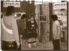 Tantiana Changsak explains to visitors